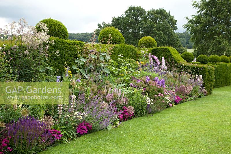 Colourful flower border at Felley Priory, Underwood, Nottingham in July.