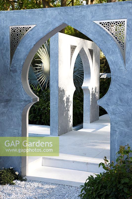 View accross a white marble gate in 'The Beauty of Islam' garden by Kamelia Bin Zaal at the RHS Chelsea Flower Show 2015