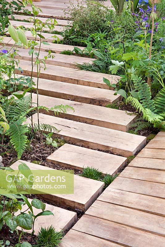 Stepping beams. The Garden of Potential. RHS Chelsea Flower Show 2016. Designer: Propagating Dan, Sponsors: Greenwood Forest Park