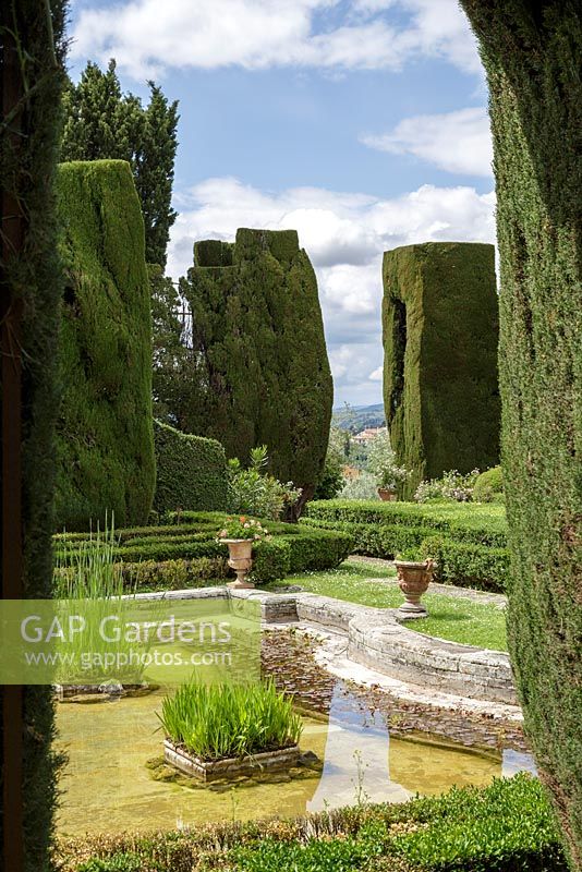 Villa Gamberaia, Settignano, Florence, Tuscany, Italy. View across the pond in the Formal Italianate garden