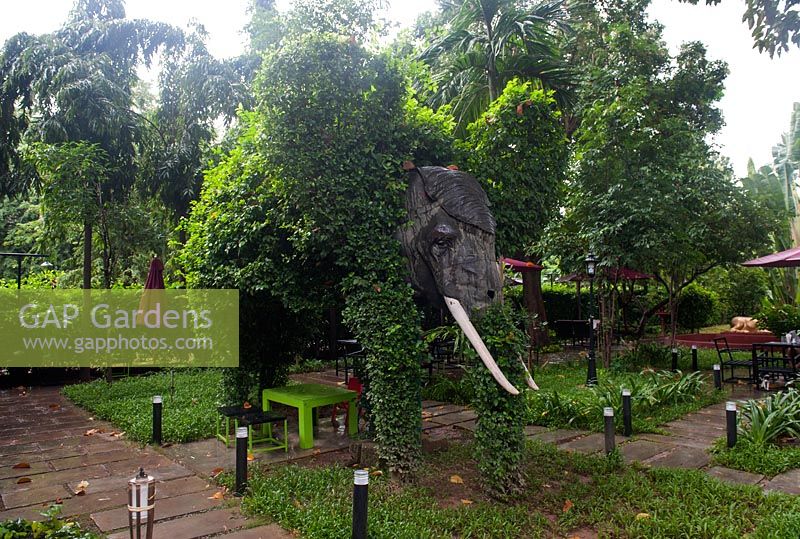 Phnom Penh Cambodia Topiary elephant in the grounds of the National Museum.
