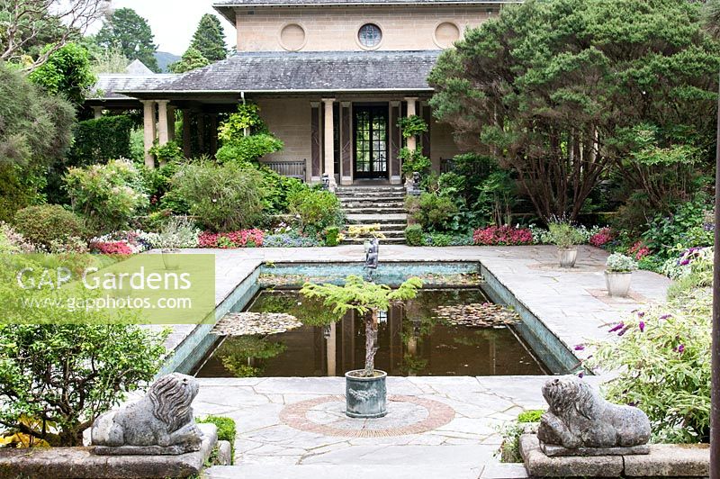 The Casita - Italian tea house and formal pool in the Italian garden of Ilnacullin - Garinish Island. Glengarriff, West Cork, Ireland. The Gardens are the result of the creative partnership of Annan Bryce and Harold Peto, architect and garden designer. August