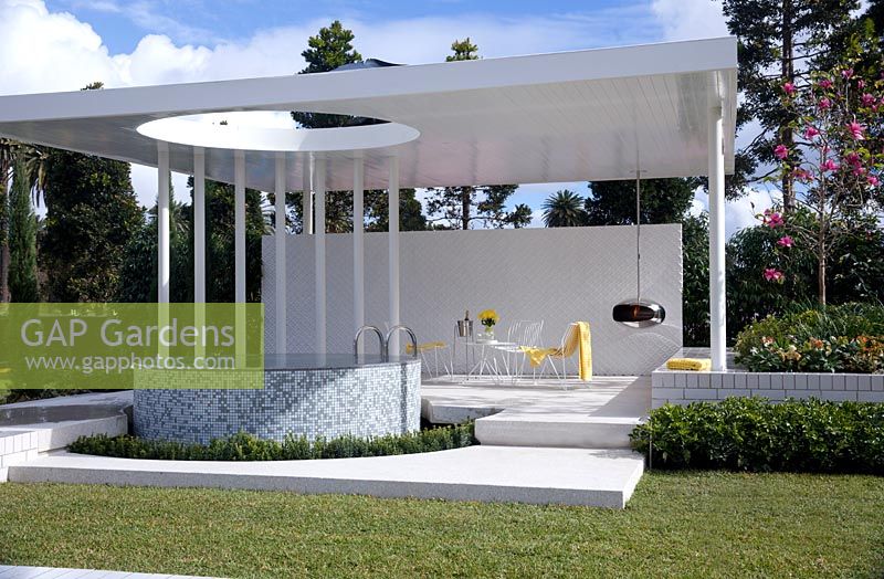 A modern pavilion featuring a plunge pool