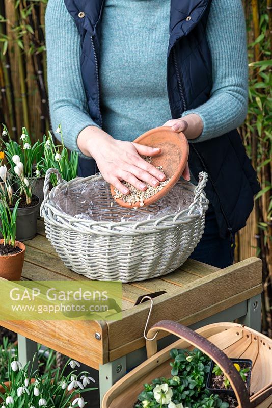 Step-by-Step Planting a January Basket. Add gravel into the bottom of the basket to improve drainage and prevent waterlogging.