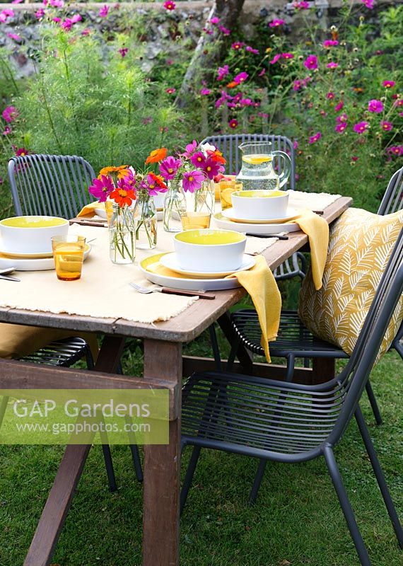 Outdoor table prepared for a Summer party