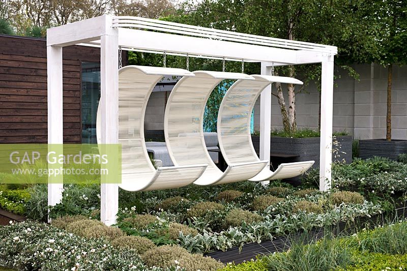 Hanging seats and frame with silver foliage drought proof planting, Rooftop Workplace of Tomorrow, RHS Chelsea 2012, May
