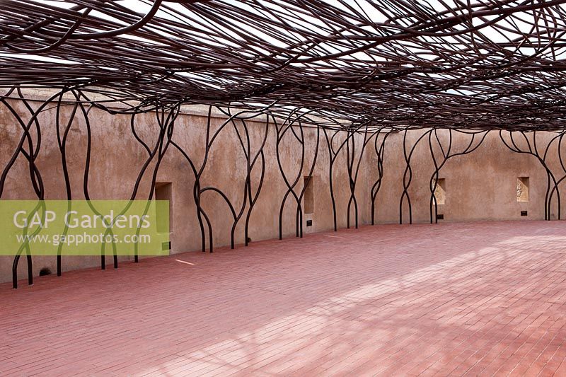 Metal pergola on roof terrace, Jardin de Migrations, Saint Jean, Marseilles, France, February.