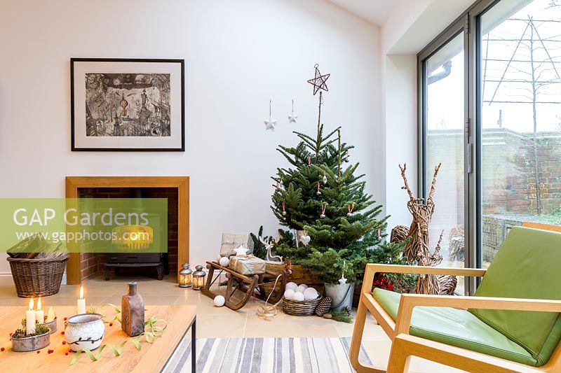 Tiered Christmas tree winter scene in living room