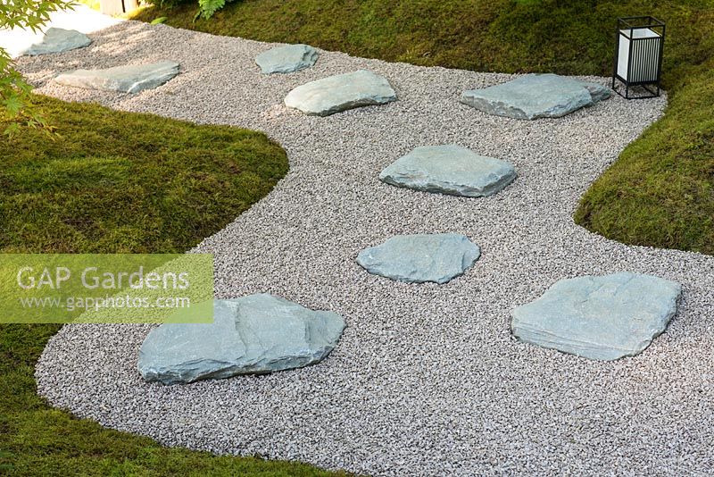Japanese style garden - path with moss, stones, gravel. The Japanese Summer Garden, RHS Hampton Court Flower Show
