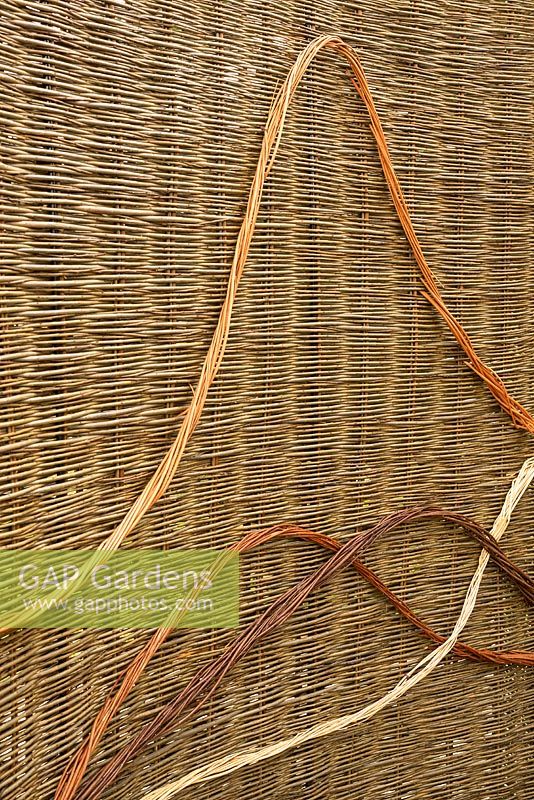 Decorative woven willow fence screen. Designers Emma Bannister and Ben Donadel