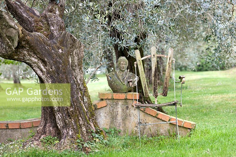 Impression with garden chair in the mediterranean garden