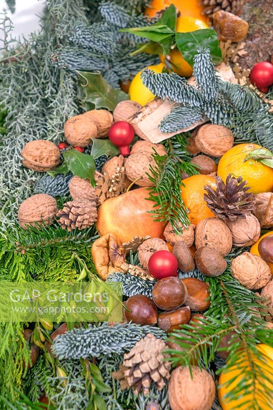 Christmas decoration with nuts and fruit