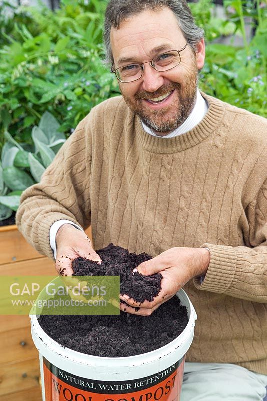 Simon Bland of Dalefoot Compost with a tub of Wool Compost