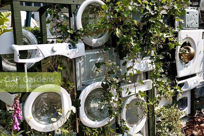 RHS Chelsea Flower Show 2010 Eden Project garden wall of recycled washing machines planted with climbers