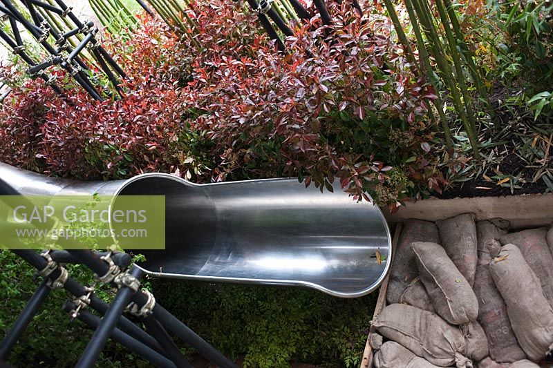 The exit to the shute on The Westland Magical Garden at RHS Chelsea Flower Show 2012 designed by Diarmuid Gavin