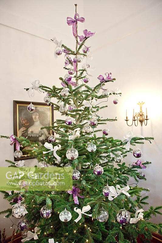 Christmas tree with purple and white ornaments