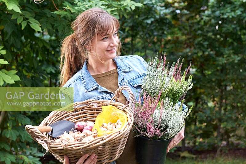 Young lady with flower bulbs