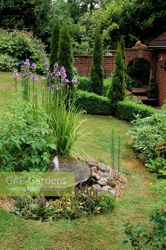 Alan Titchmarsh's garden Hampshire Mill stone water feature