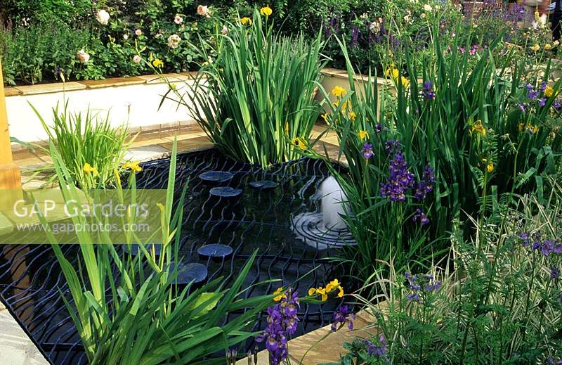 Chelsea FS 2000 design Robin Templar Williams raised formal pond with fountain and child safe mesh Iris