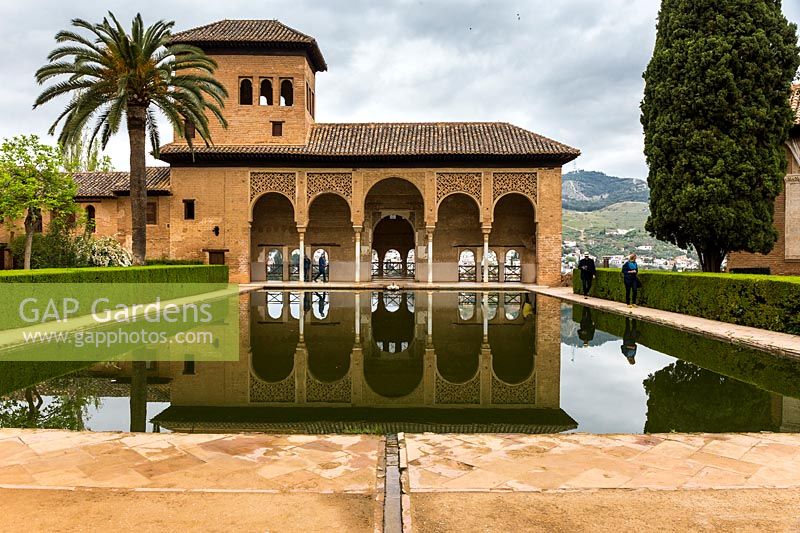 Torre de las Damas, Palacio del Partal pool with reflections, The Alhambra, Granada.