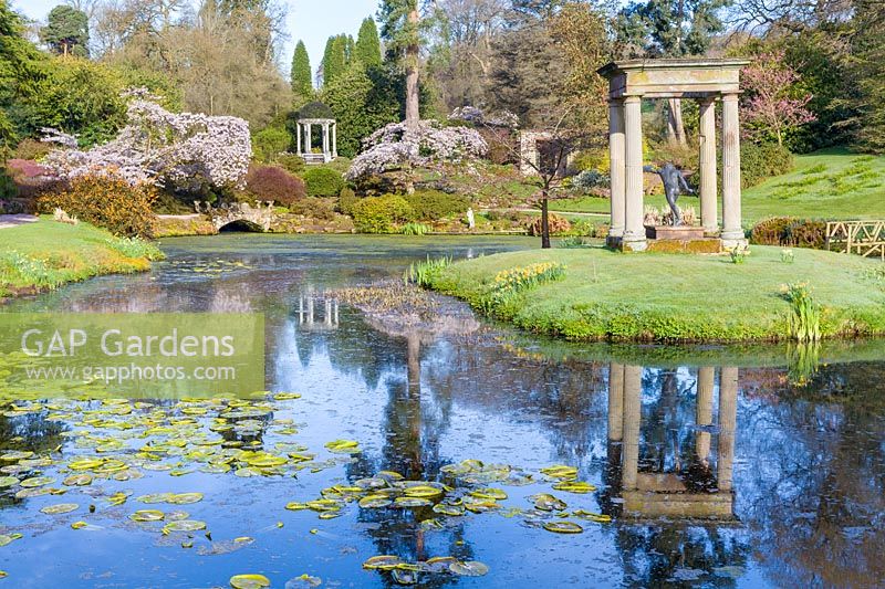 View of lake in The formal Temple Garden at Cholmondeley Castle, Cheshire, UK.