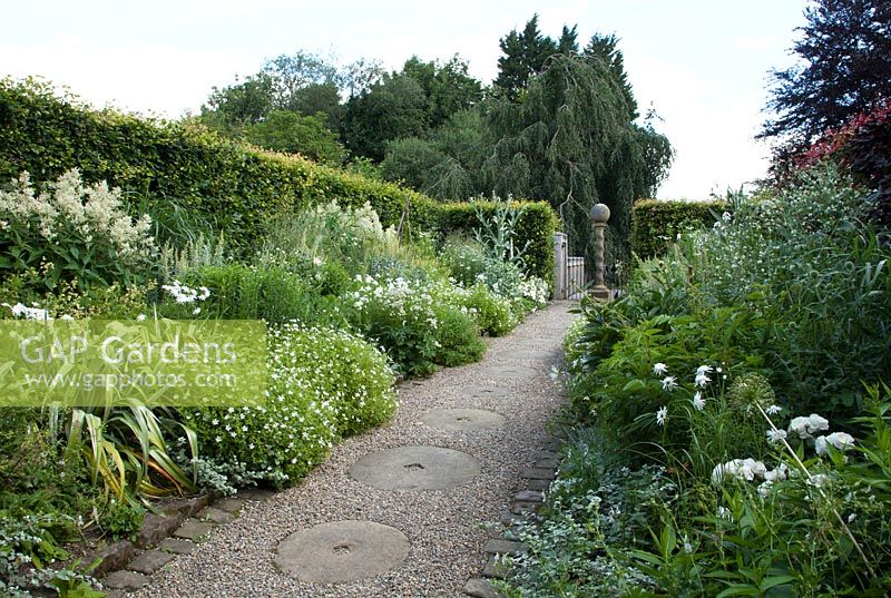 Double Perennial flowerbeds in the White Garden at York Gate, Leeds Yorkshire, UK.