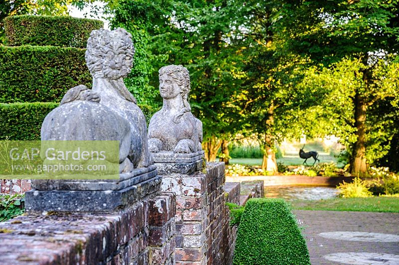 A pair of sphinx statues. Dipley Mill, Hartley Wintney, Hants, UK