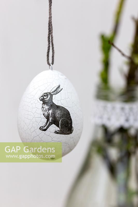 Decorative Easter egg with rabbit embellishment. 