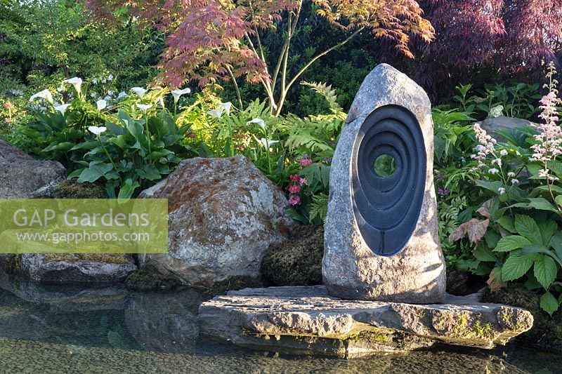 Large pond water feature in 'At One With A Meditation Garden' - Howle Hill Nursery, RHS Malvern Spring Festival, 2017.