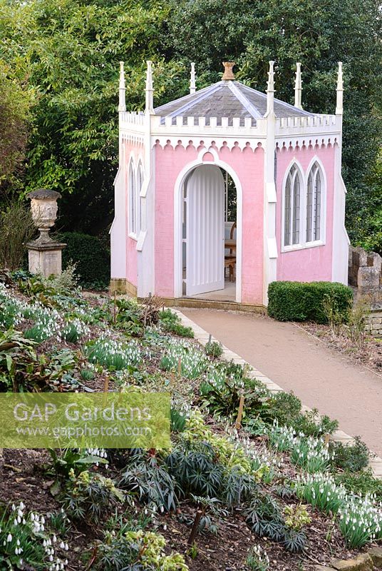 Pink and white Eagle House. Painswick Rococo Garden, Painswick, Glos, UK. 