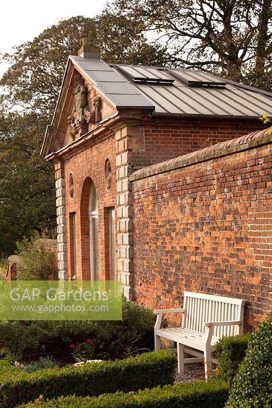 One of the classical Orangeries built into the brick wall in the Walled garden at Castle Bromwich Hall Gardens, UK. 