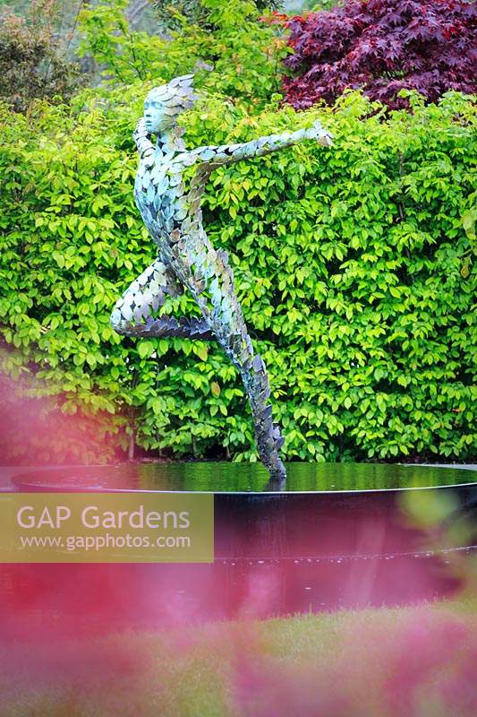 Sculpture of Athena, by Simon Gudgeon. The Leaf Creative Garden, designed by Peter Dowle, planting by Howle Hill Nursery. RHS Malvern Spring Festival, 2019.