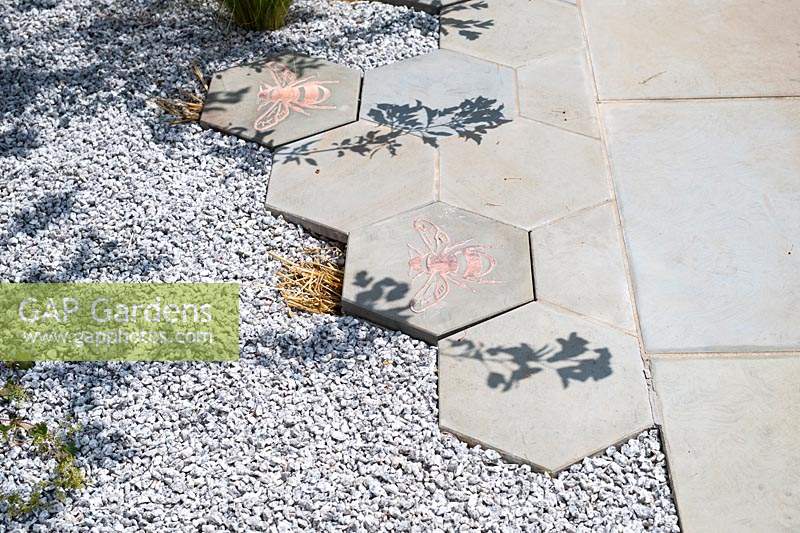 Aggregate surface meets hexagonal paving on the The Urban Pollinator garden RHS Hampton Court 2019 - Designed by Caitlin McLaughlin