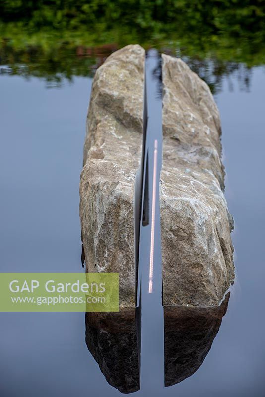 Split boulder from The Forest of Dean with light - The Leaf Creative Garden - A Garden of a quiet contemplation - RHS Malvern Spring Festival 2019
