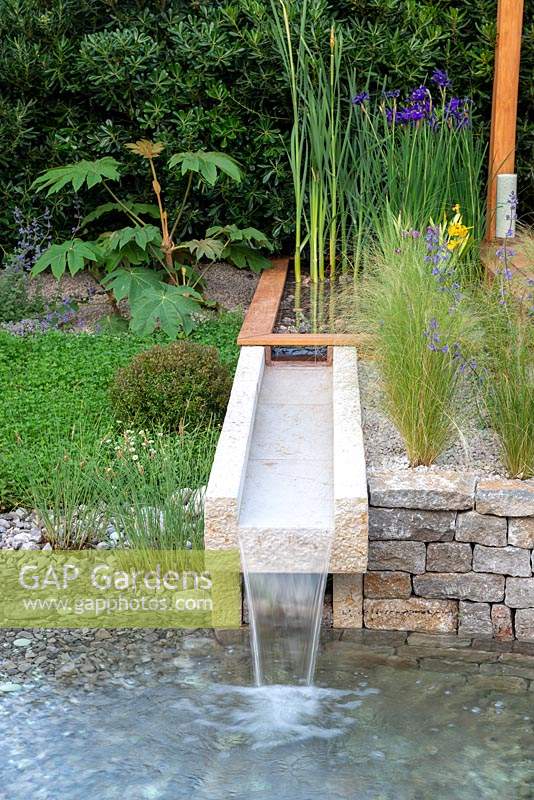 Water feature powered by solar panels The Harmonious Garden of Life, RHS Chelsea Flower Show 2019.
