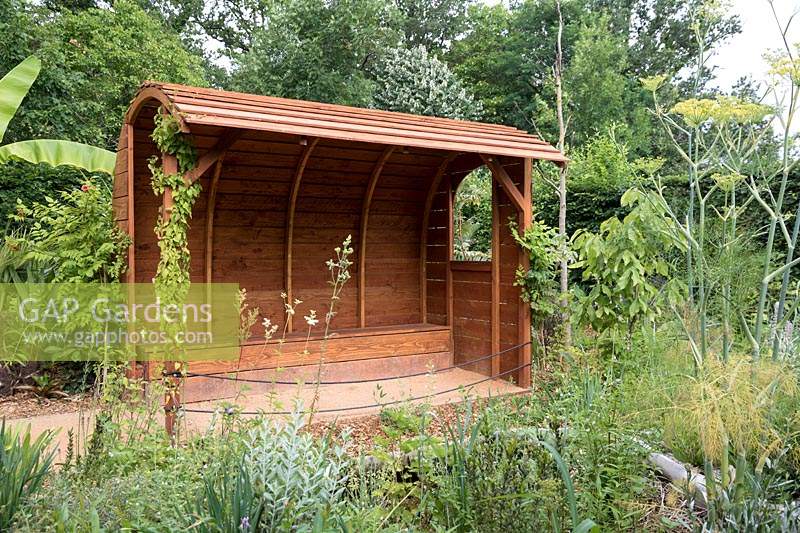 Cultivons Notre Paradis, Cultivating Our Paradise. Festival International des Jardins 2019, Domaine de Chaumont sur Loire, France. Wooden garden shelter.