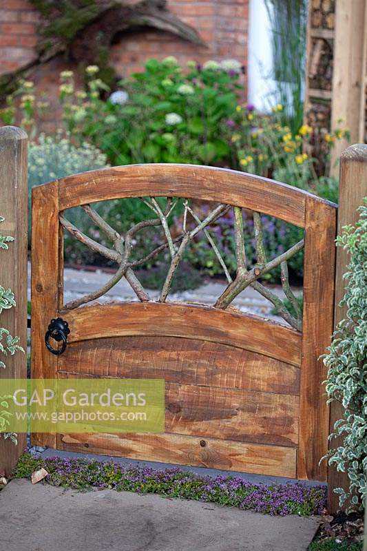 Hand made garden gate in the 'Living in Sync' garden at BBC Gardener's World Live 2017