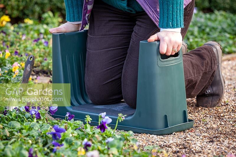Garden kneeler with sides for help getting up. 