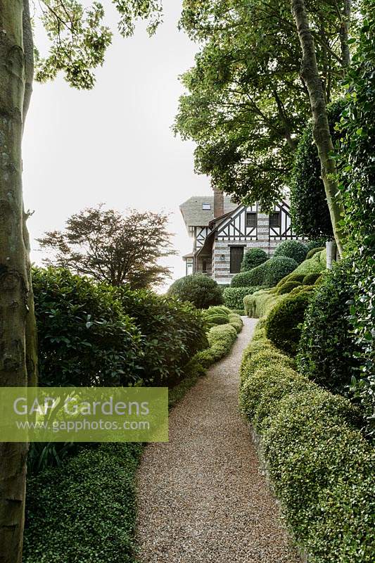 Path running along towards the house. Les Jardins d Etretat, Normandy, France.