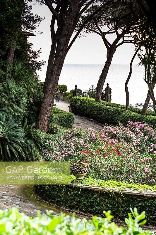 Formal gardens with ocean view, at Villa Agnelli Levanto, Italy.

