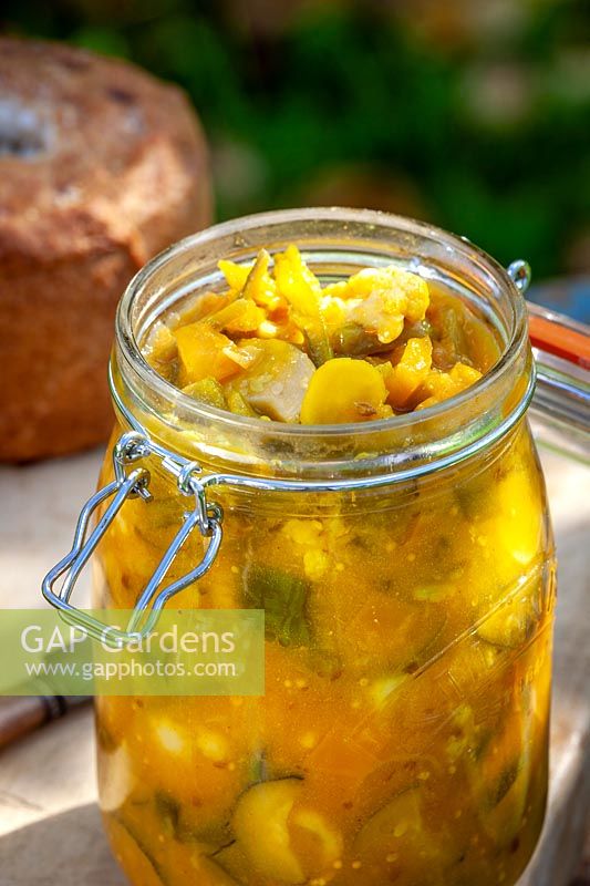 Piccalilli - garden pickle - in a kiln jar. Ingredients include cauliflowers, courgettes, cucumbers, turmeric and mustard