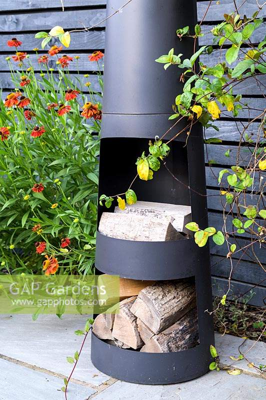 Modern Town Garden in Essex - black wood burner