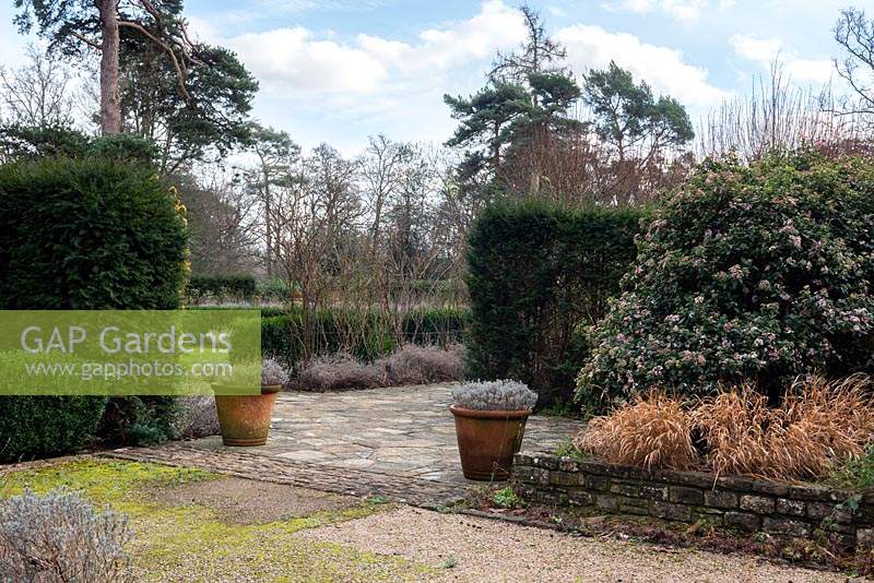 The West Courtyard leading through to the Lawn Terrace and Pleached Lime Walk. 