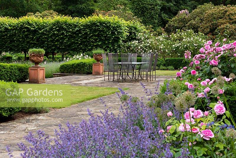 The Jekyll Border and Lawn Terrace, with The Pleached Lime Walk beyond. 