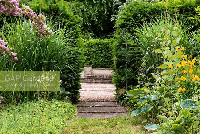 The Herbaceous Walk leading into the Tranquility Pond garden. 