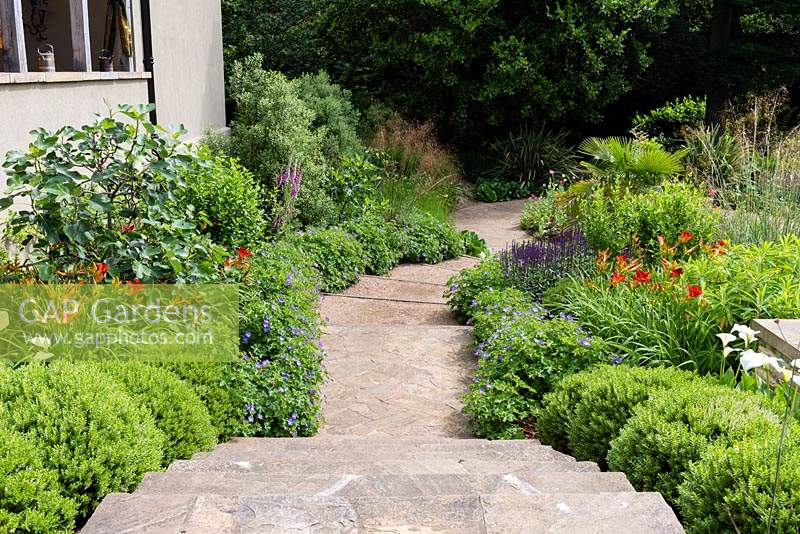 View looking down the steps to the The Loggia Garden from the East Courtyard. 