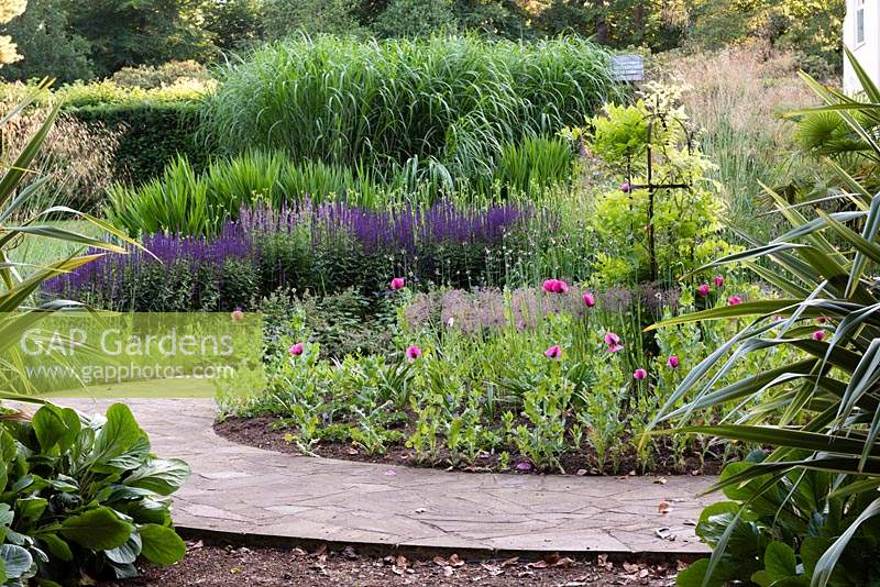 View across the Loggia garden to circular flowerbed. 