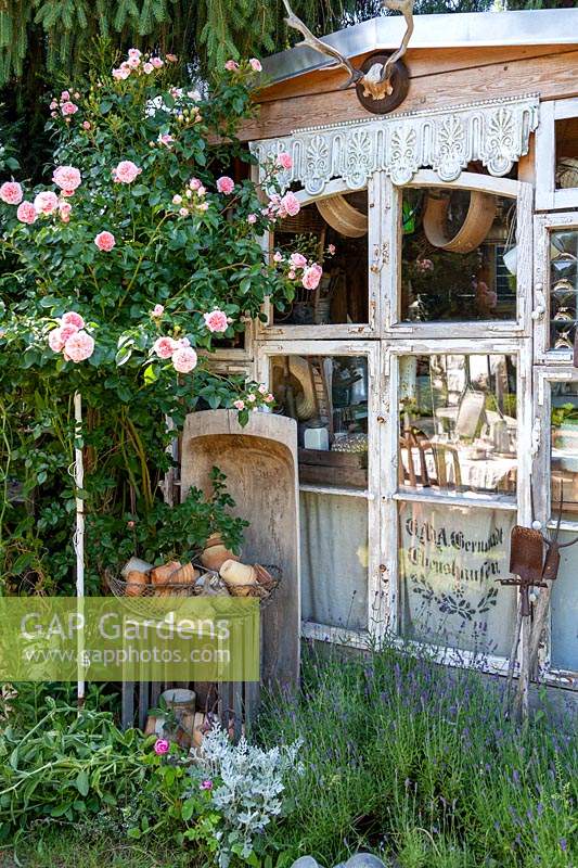 Shed made from old windows and decorations