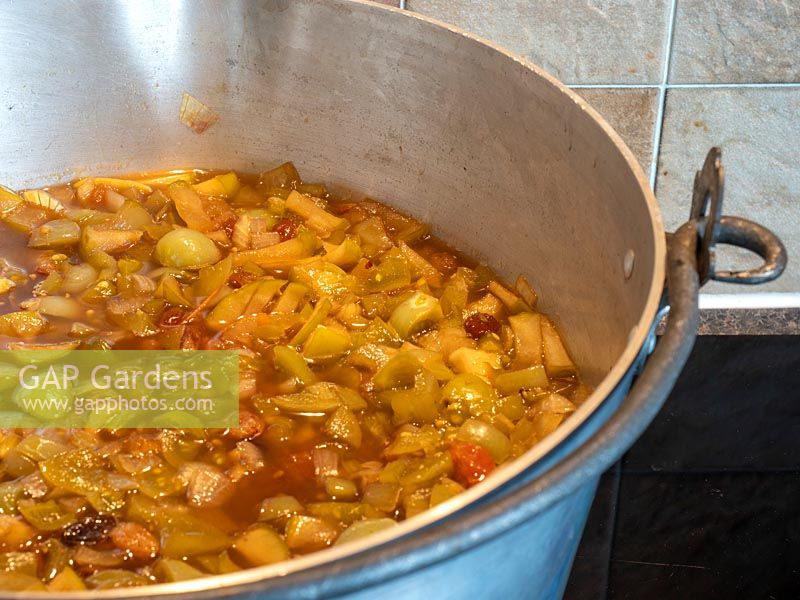 Cooking Green Tomato Chutney in large preserving pan