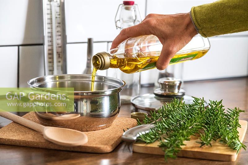 Pouring olive oil in saucepan